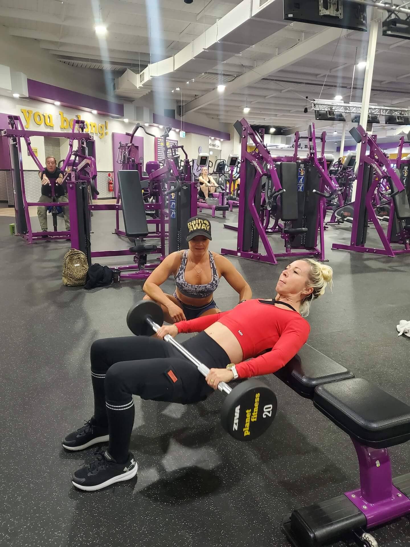Jess working one-on-one with a client in the gym